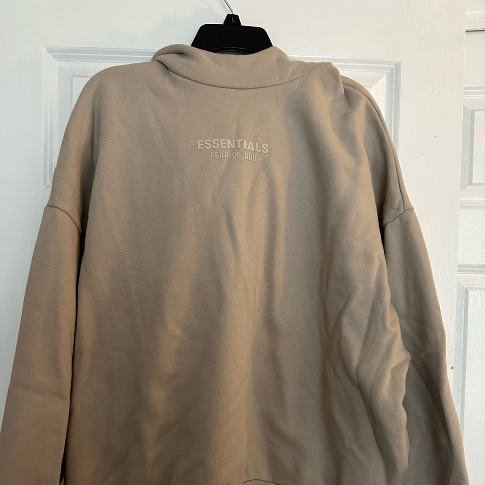 Essential Fear of God hoodie, off white size Large. Never worn, no tags.